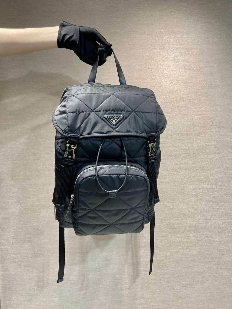 prada-2vz135-re-nylon-padded-backpack-with-hood-black-1-luxibags.ru