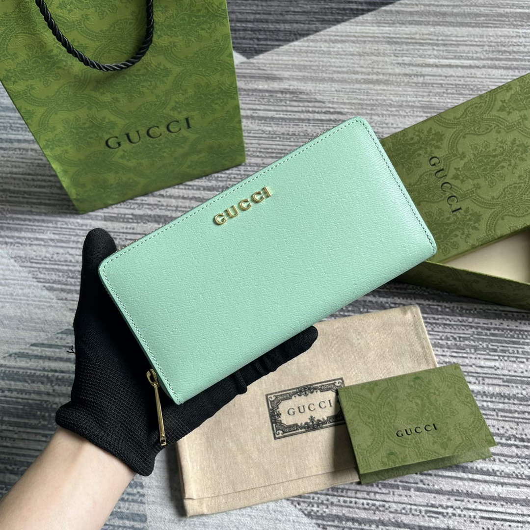 gucci-772642-zip-around-wallet-with-gucci-script-pale-green-1-luxibags.ru