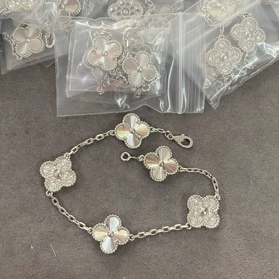 van-cleef-arpels-vintage-alhambra-bracelet-5-four-leaf-lucky-totems-vcarp4kn00-white-gold-1-luxibags.ru